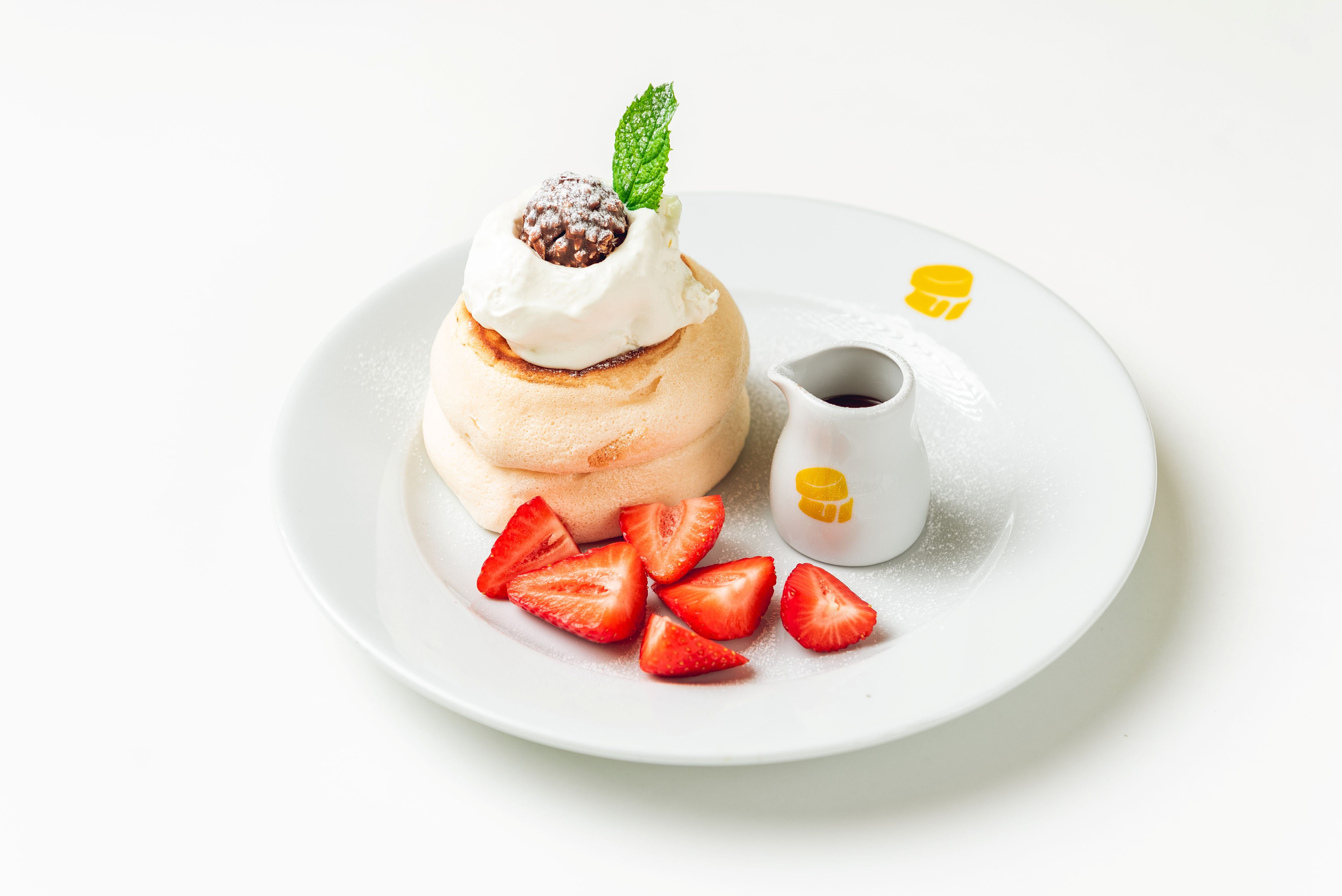 Fuwa Fuwa Nutella strawberry soufflé pancake with fresh fruit.